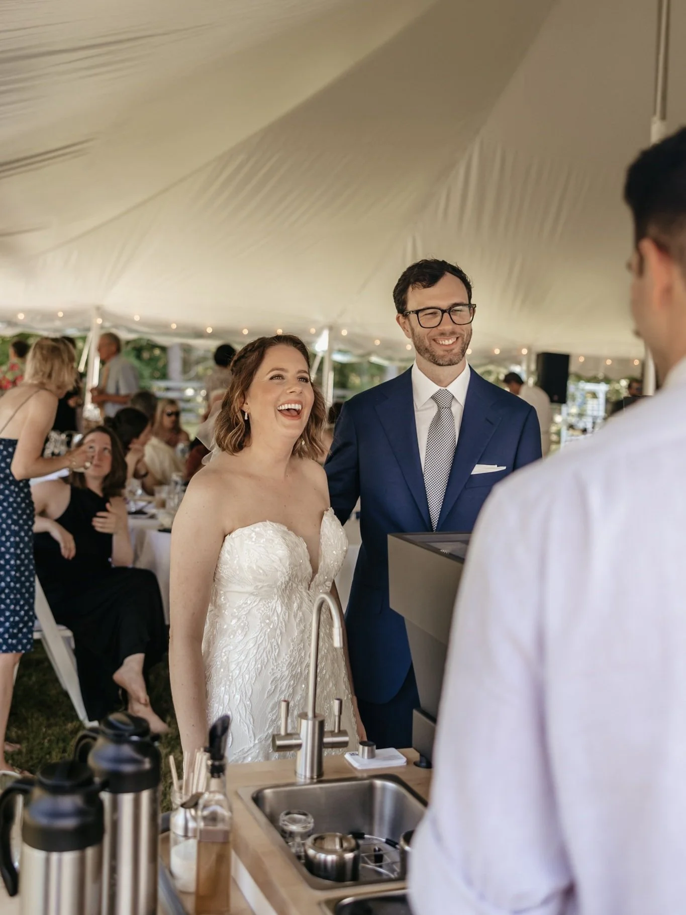 Barista crafting a signature drink for wedding guests