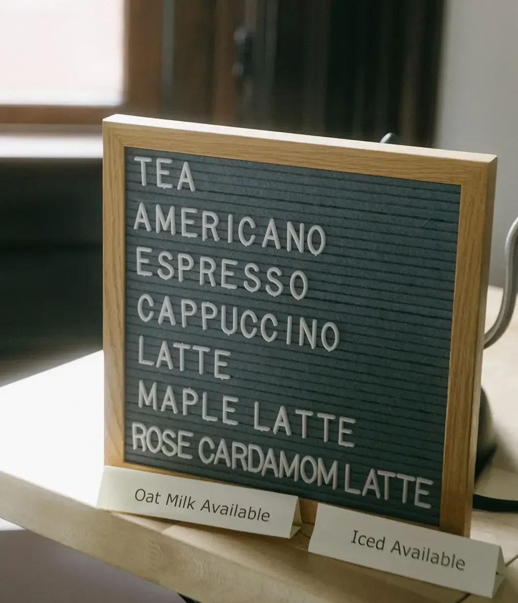 Menu board with drink options at a wedding coffee bar